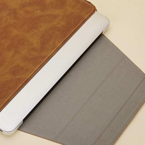 Computer sleeve with invisible stand