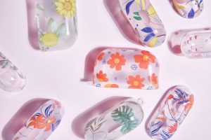 Vibrant blue earphone case showcasing mobile accessory colors, designed for protection and personalization.