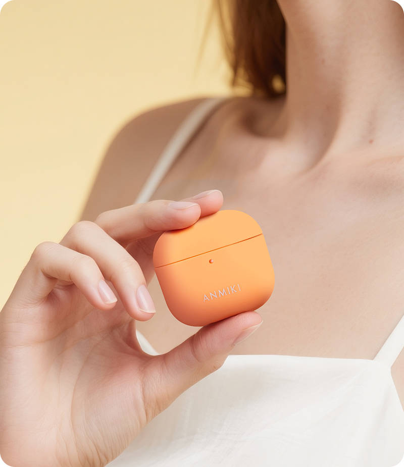 Lifestyle image of orange earbud case