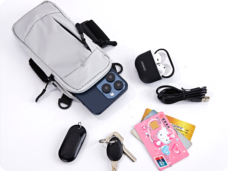 Open pouch with phone and daily essentials