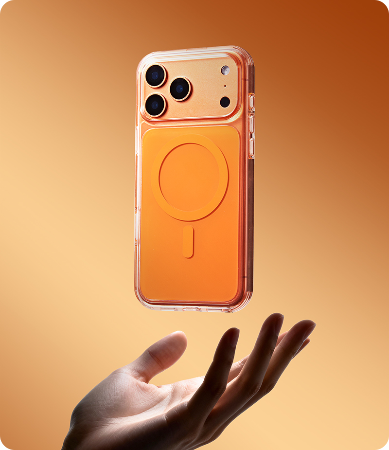 Orange pro style magnetic phone case floating above hand