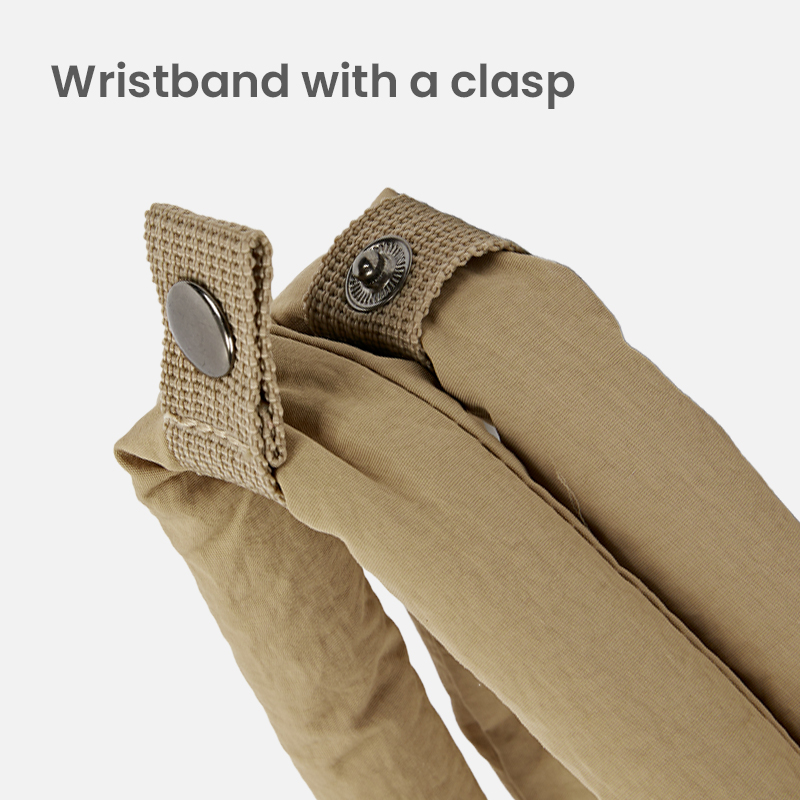 Clasp detail on padded laptop bag handle